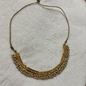 Gold tone and faux pearl Necklace